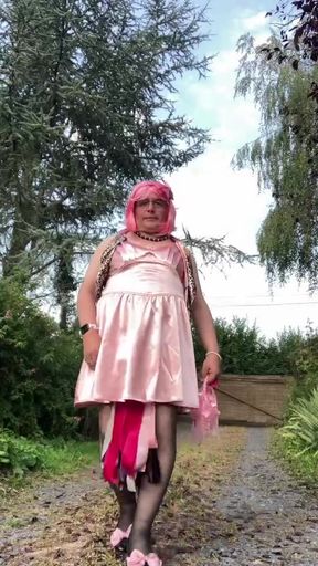 In an outfit with a pink dress for an evening out