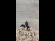Femboy tries on a dress in fitting room