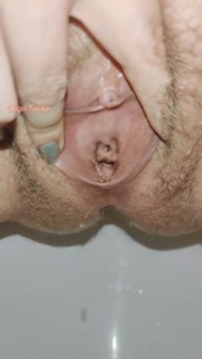 Hairy pussy pissing close up with toilet splashing