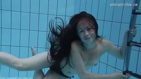 Shameless teens staged a horny naked swim in a public pool