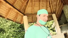 Naughty nurse plays with her big nubs while the doctor examines her ass