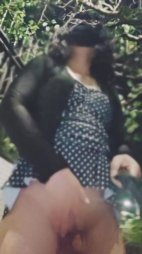 Wearing a Printed Dress and Exposing Herself on the Street at Night