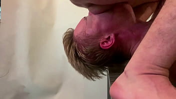 Severe throat fucking of my slave. I cum very deep into his throat. And a huge dildo in his mouth