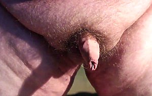 Fat boys tiny penis being pushed around while standing up.
