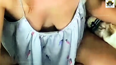 Small-titted chick flashes her shaved pussy and jerks off during a downblouse broadcast