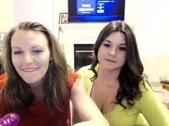 Sexy brunette lesbian riding a big strapon