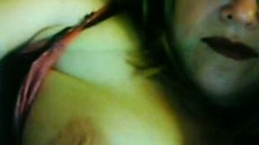 Lewd fair-haired milf licks her big jugs in front of a webcam