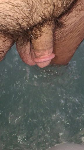 Saggy wet balls and cock in the hot tub