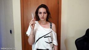 Ramona Lynn is smoking all-white Virginia Slims 120s cigarette at the bedroom at home lighting with a match 4K resolution