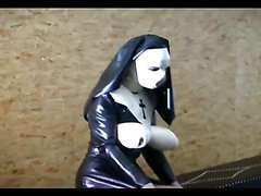 Busty girl in latex masturbating