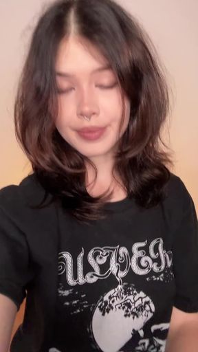 Woman with short hair in a black t-shirt