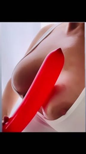 Stroking a Balloon On My Oiled Titties And Then I Squirt