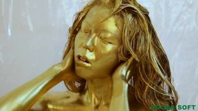 Asian in gold paint pleasured