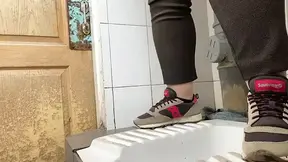 Mature milf pees in a hospital public toilet