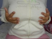 A hot milf gets turned on by touching her huge tits, imagining that she has several men fucking her.