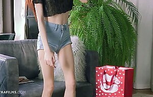 ULTRAFILMS Hot redhead Sherice fingering and riding a colorful toy on the table