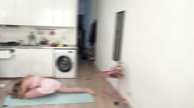 Petite blonde gymnast stretches her tiny pussy in pink shorts
