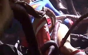 Supergirl prisoner of tentacles!