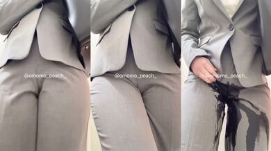 Grey pants suit waiting for toilet then sudden dribble leak wheezing