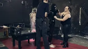 Mistress April punishes slaves in femdom scene