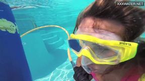 Blonde pornstar Irina Poplavok lounges in the pool