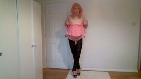 Strawberry blonde in pink basque and leather trousers