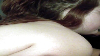 Fiery redhead rides hard for a deep creampie on the couch