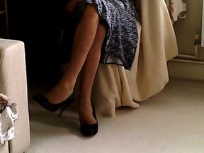 Denise crossing legs and teasing in gorgeous pantyhose with high heels