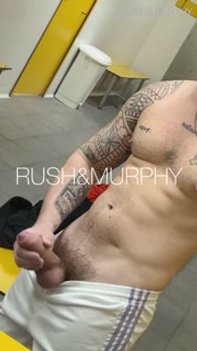 He masturbates his huge cock in the gym showers while muscular straight man spies on him
