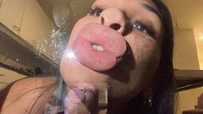 Messy spit kisses on glass