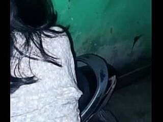 Fucking on a motorbike in a residential alley almost by residents