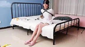 College GF tries on restrictive leather restraints while getting her feet