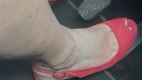 Driving in open toe wedge heels Coral heels and French Manicure