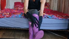 Me with my purple hunter boots and latex gloves on my bed