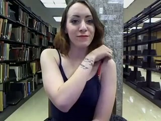 Perverted librarian shows off her juicy nipples