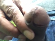 Long public piss in a park from a hard cock