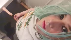 Crossdresser Pina in Bathroom Green Wig
