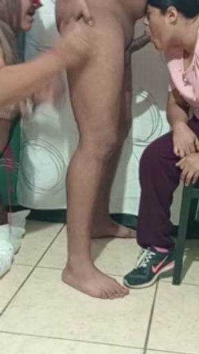 Mature MILF and 20-year-old girl sucking cock