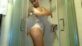 Breath-taking girlfriend taking shower in front of the camera