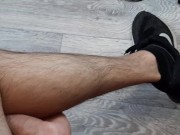 Russian guy with hairy legs jerking off his big dick in sneakers