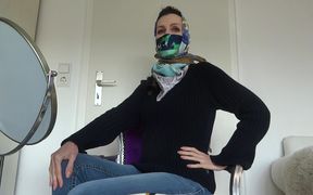 Silk cloth mask and headscarf with turtleneck sweater and jeans