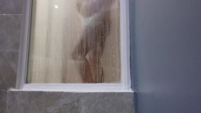 I take a nice bath at the hotel while I wait to relax.