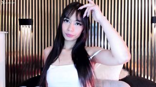 Black-haired girl seduces with her delicious lips