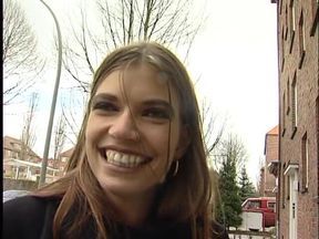 Brunette beauty interviewed on the street
