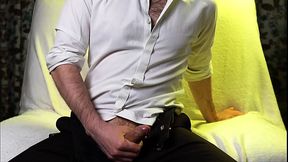 A guy with very sexy hands jerks off his small cock and cums loudly on camera.