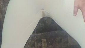 Slow-motion pee in white bodysuit and masturbation