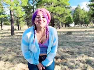 colorful kutie pees outdoors