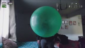 Green Giant Balloon and Black attire