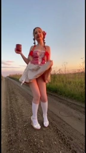 In the field showing my ass to passing cars