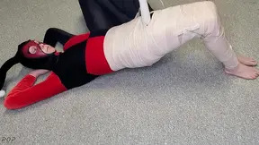 Harley Quinn wrapped in layers of mummification bondage then teased with a wand & made to cum